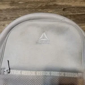 Reebok | Bags | Reebok Phoenix Mini Backpack Gray Front Zipper Pocket ...